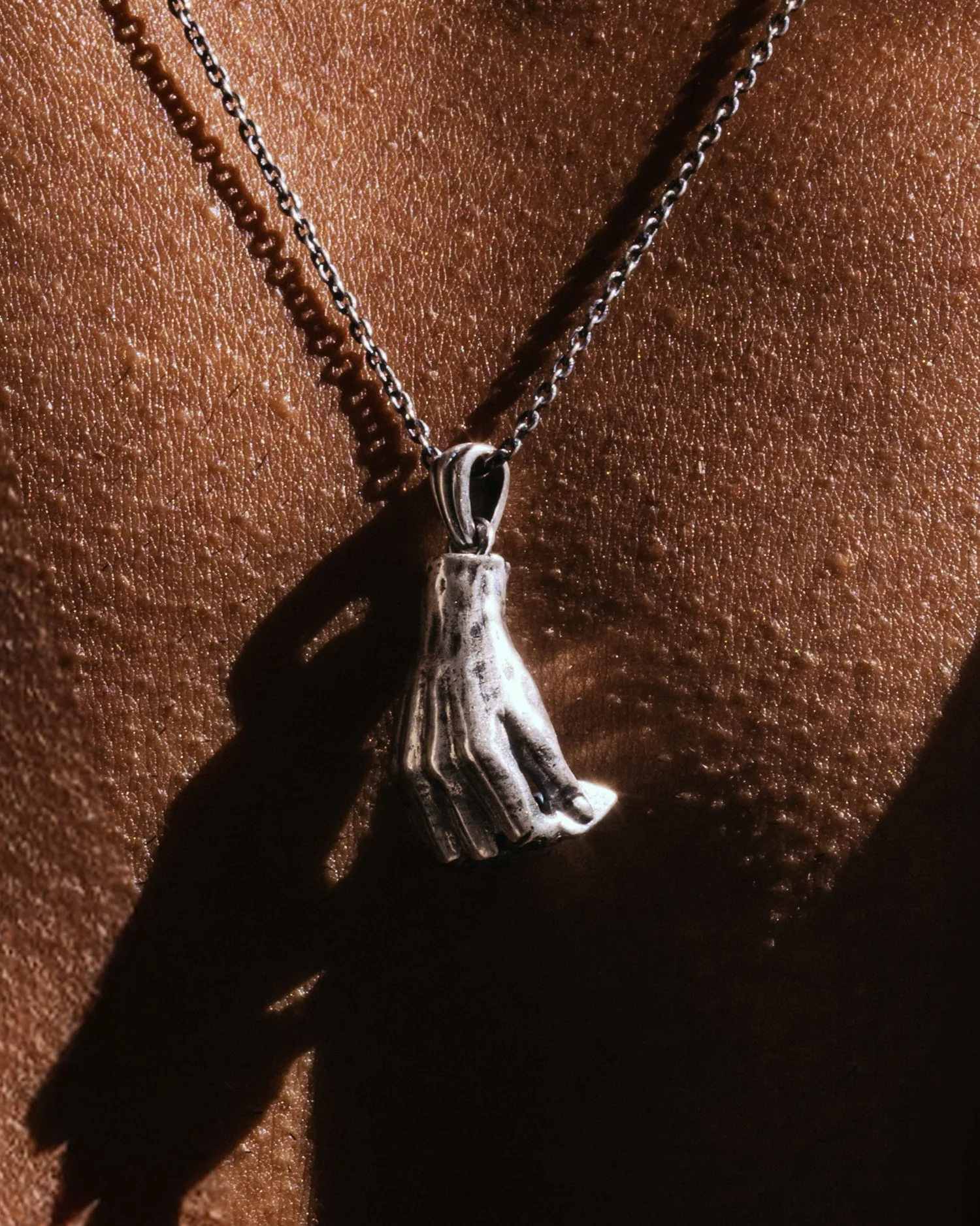 Silver Hand Plectrum Pendant Necklace